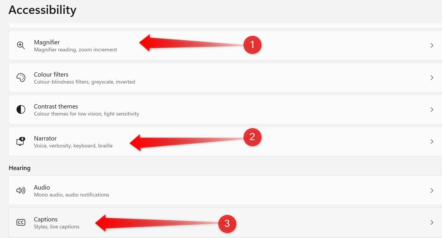 Enabling the magnifier, narrator and captions in the Windows Settings app.