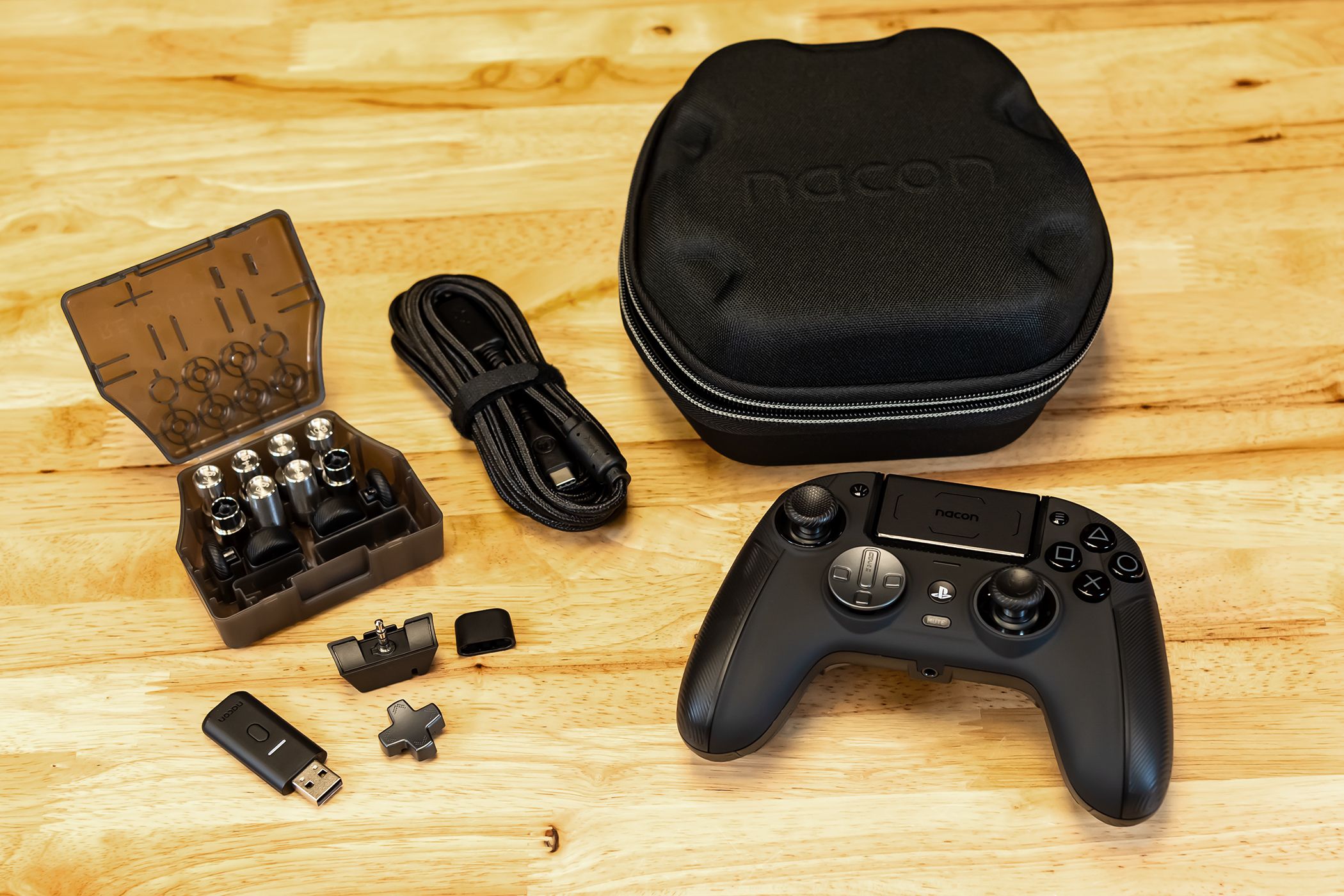 The Nacon Revolution Pro 5 Controller and its accessories.