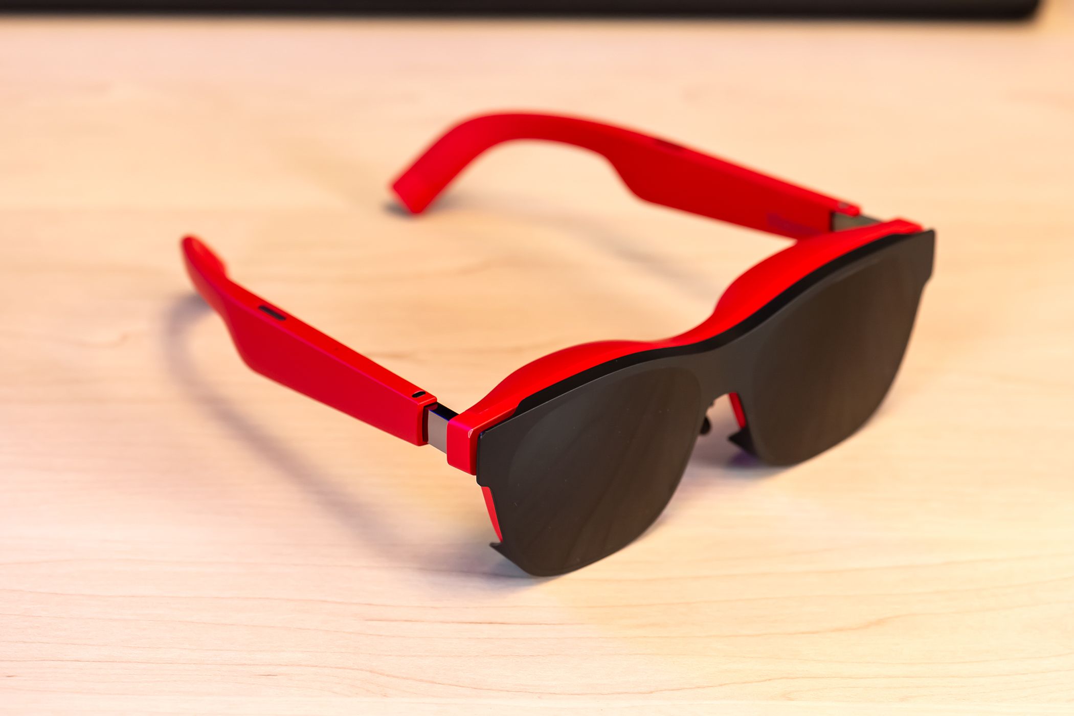 Angled view of the XREAL Air 2 glasses with the light dimmer on