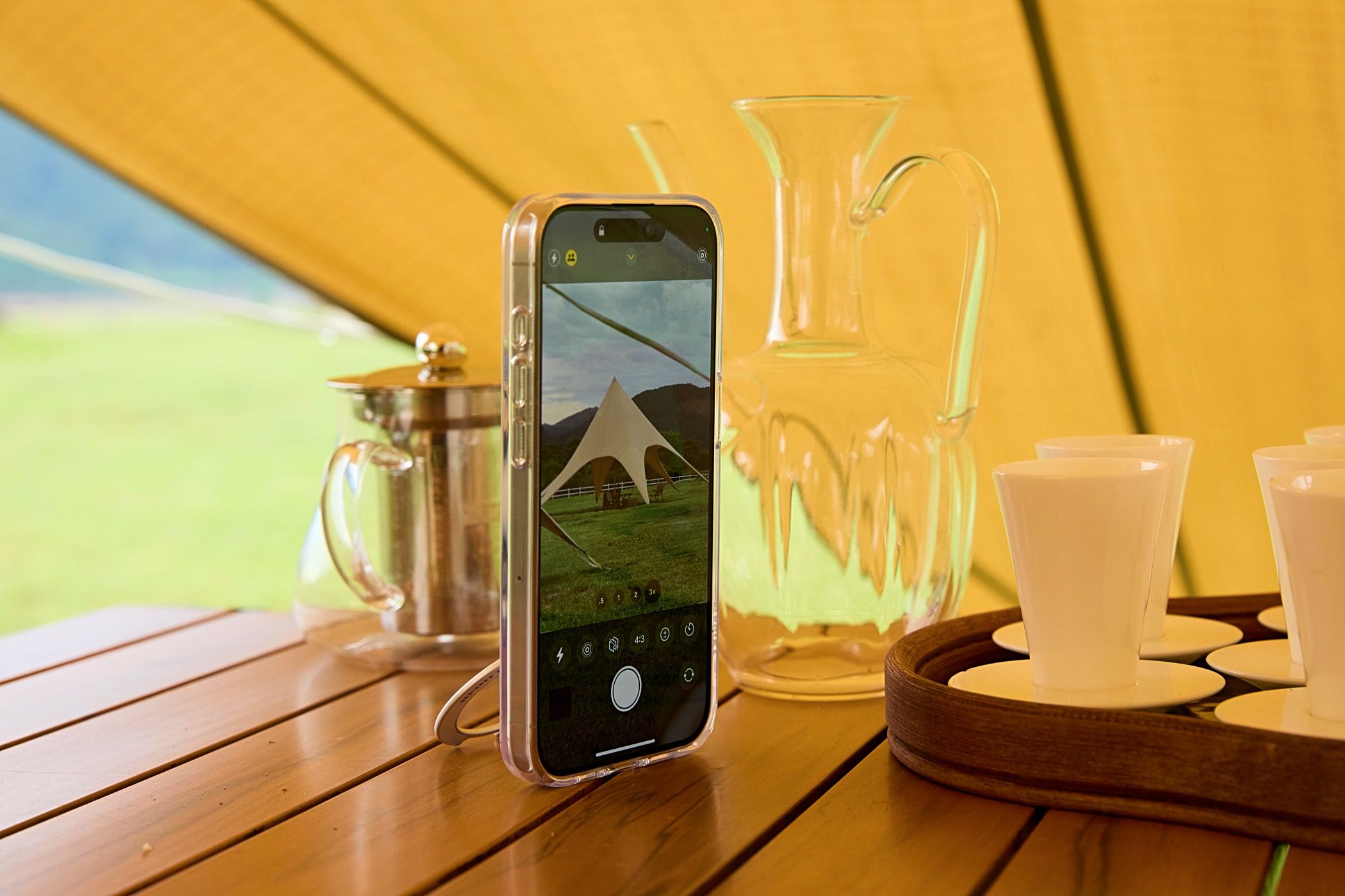 A TORRAS stand supporting a smartphone on a table