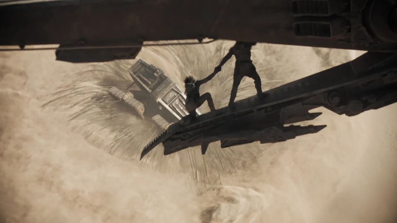 Dune scene showing a sandworm eating a sandcrawler.