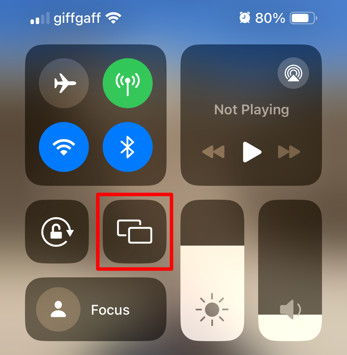 iPhone Control Center highlighting 'Screen Mirroring' option.