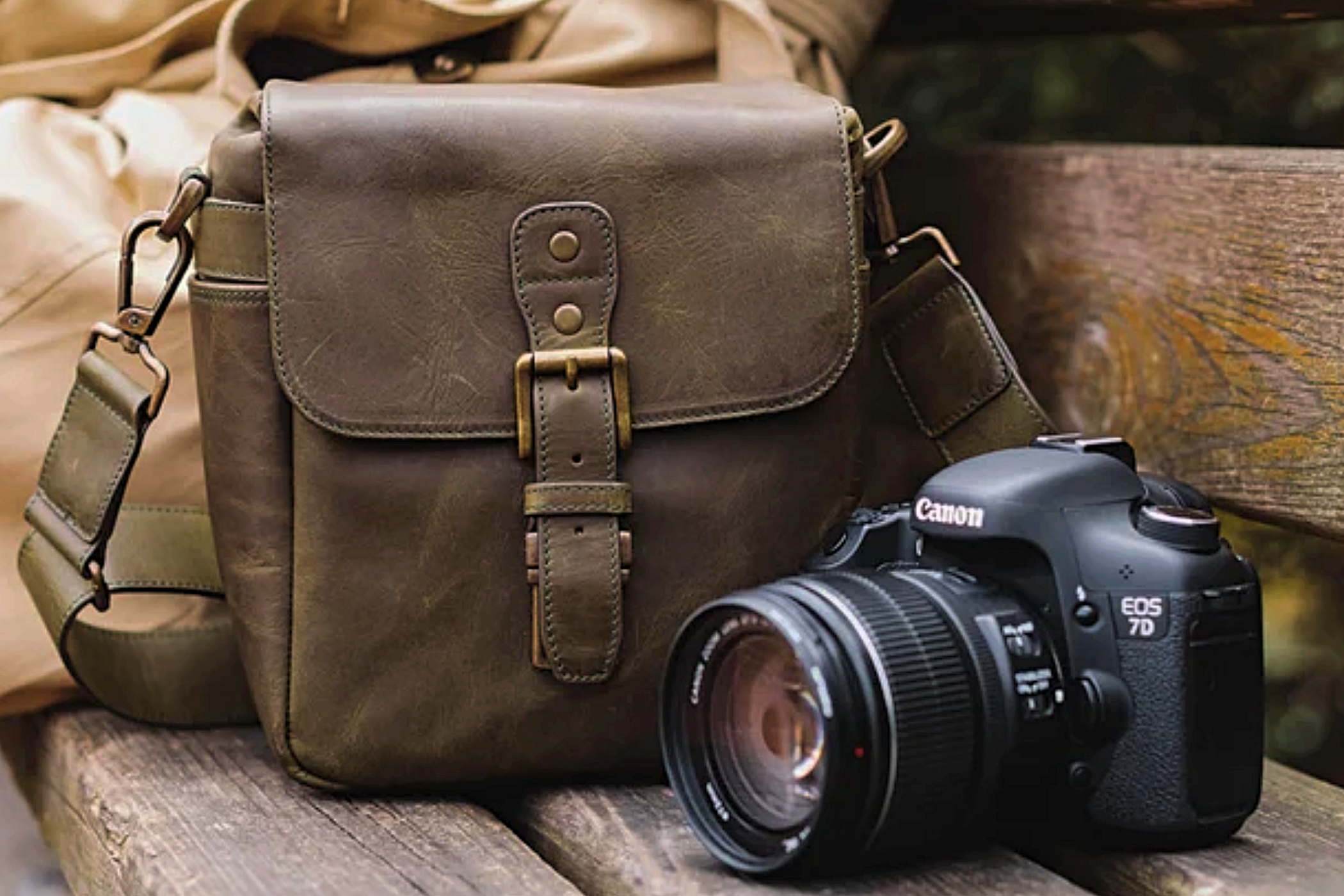 A MegaGear Torres Mini camera bag next to a canon camera.