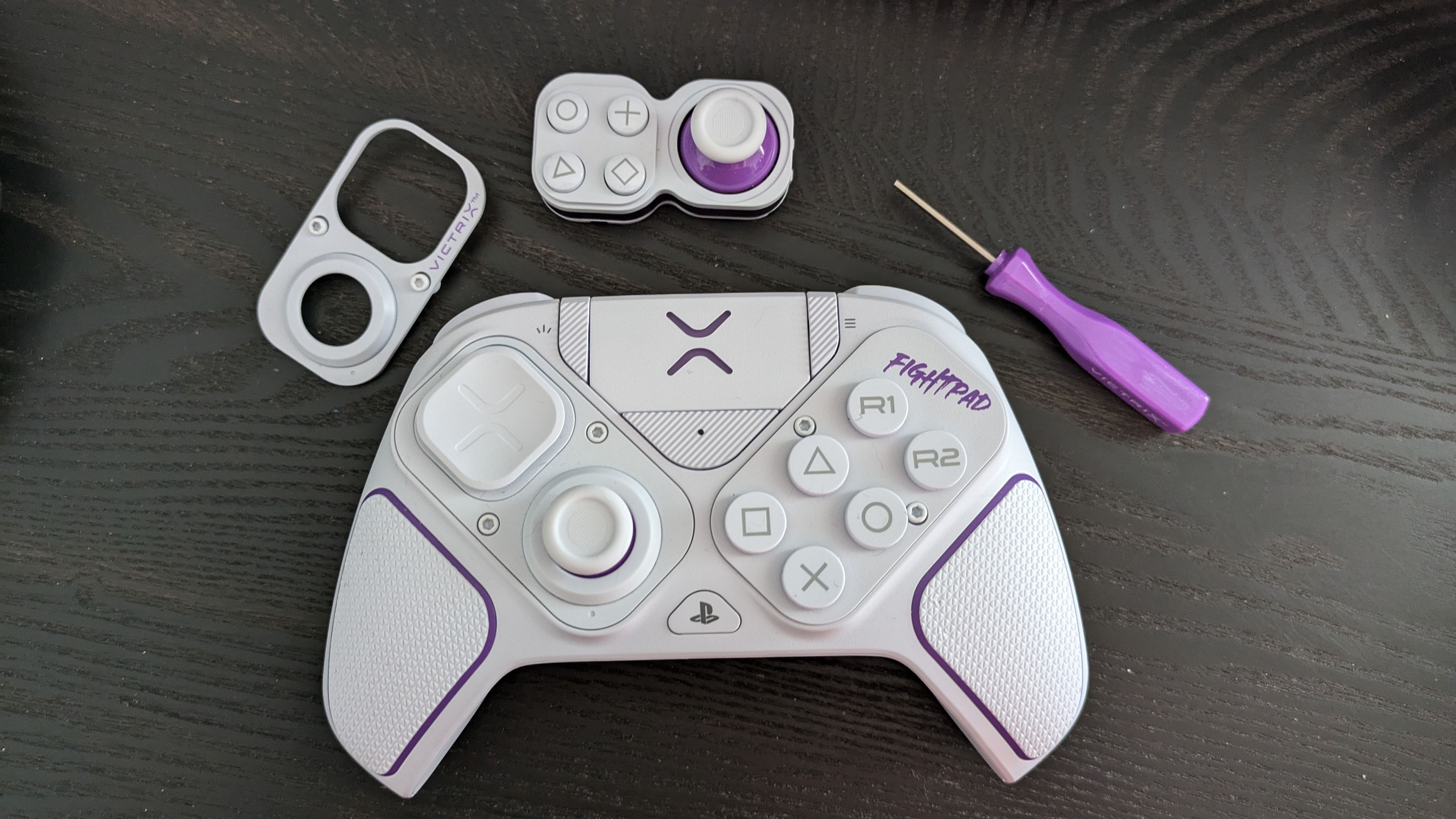 PDP Victrix Pro with parts around it.