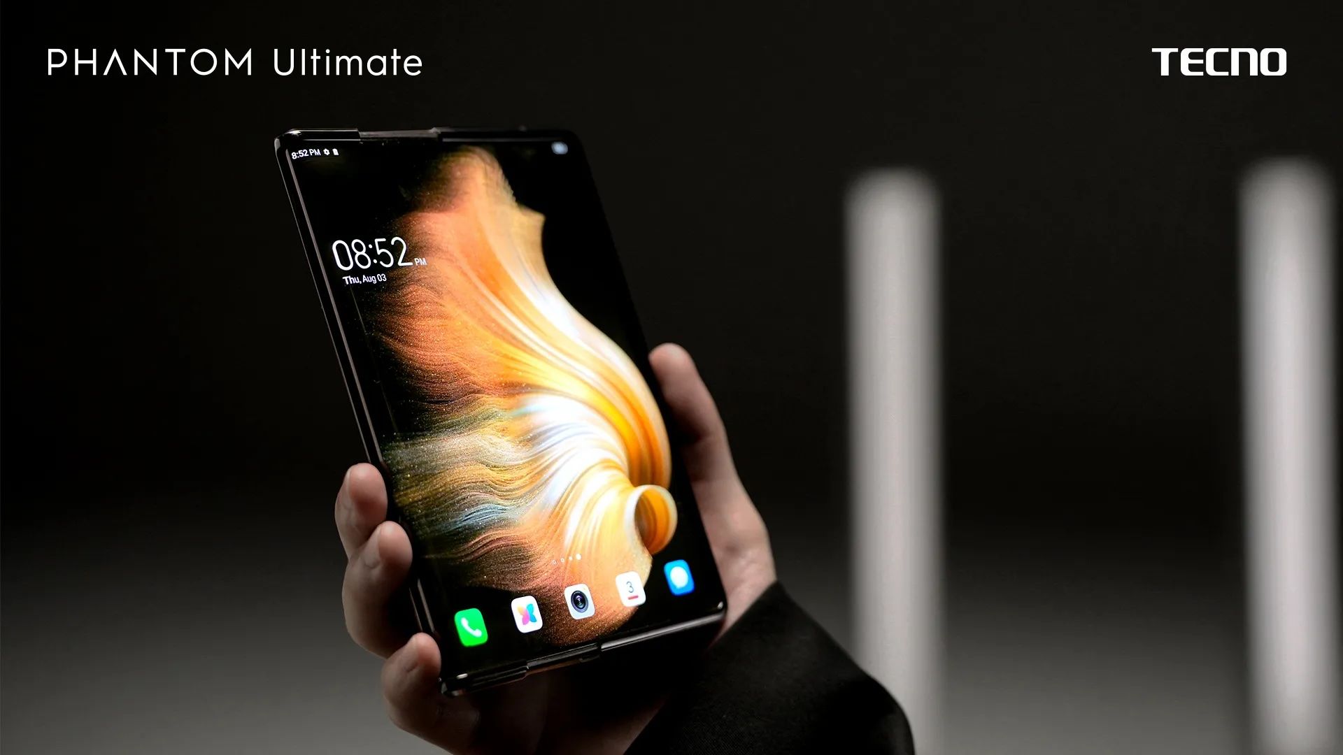 The Phantom Ultimate 3 rollable phone held in a hand.