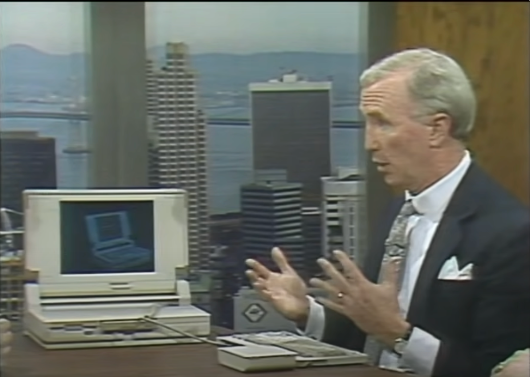 Scene from 1989 computer chronicles episode showing old-style portable computer.