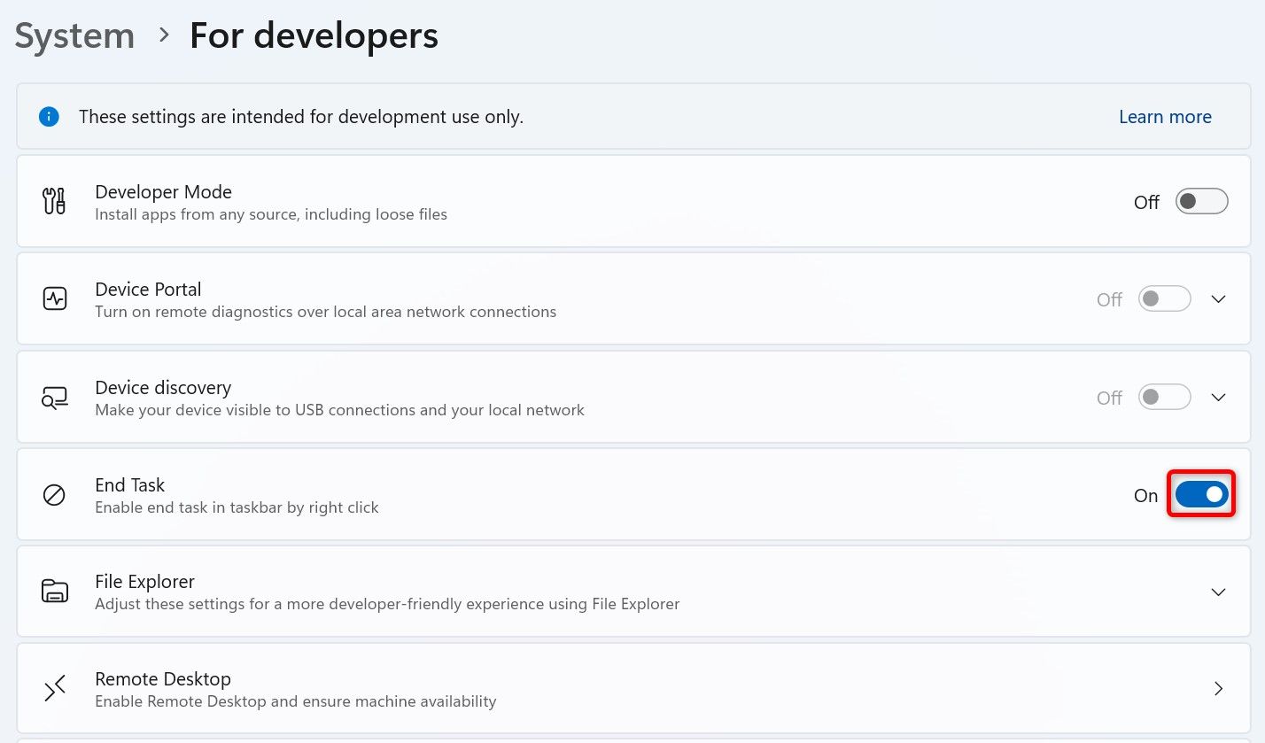 The 'End Task' toggle highlighted in Windows 11 Settings.