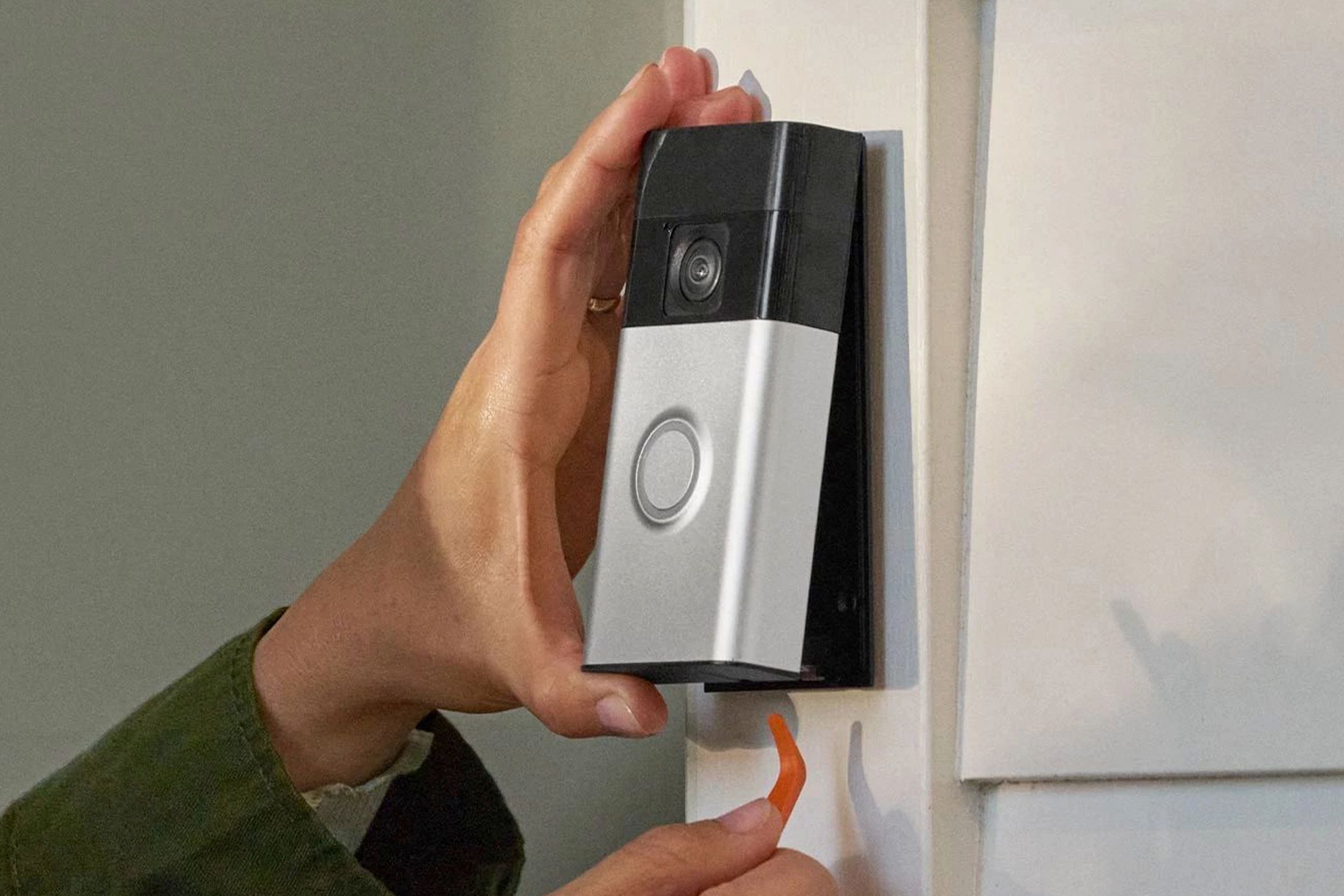 Removing the Ring Battery Doorbell from the wall.