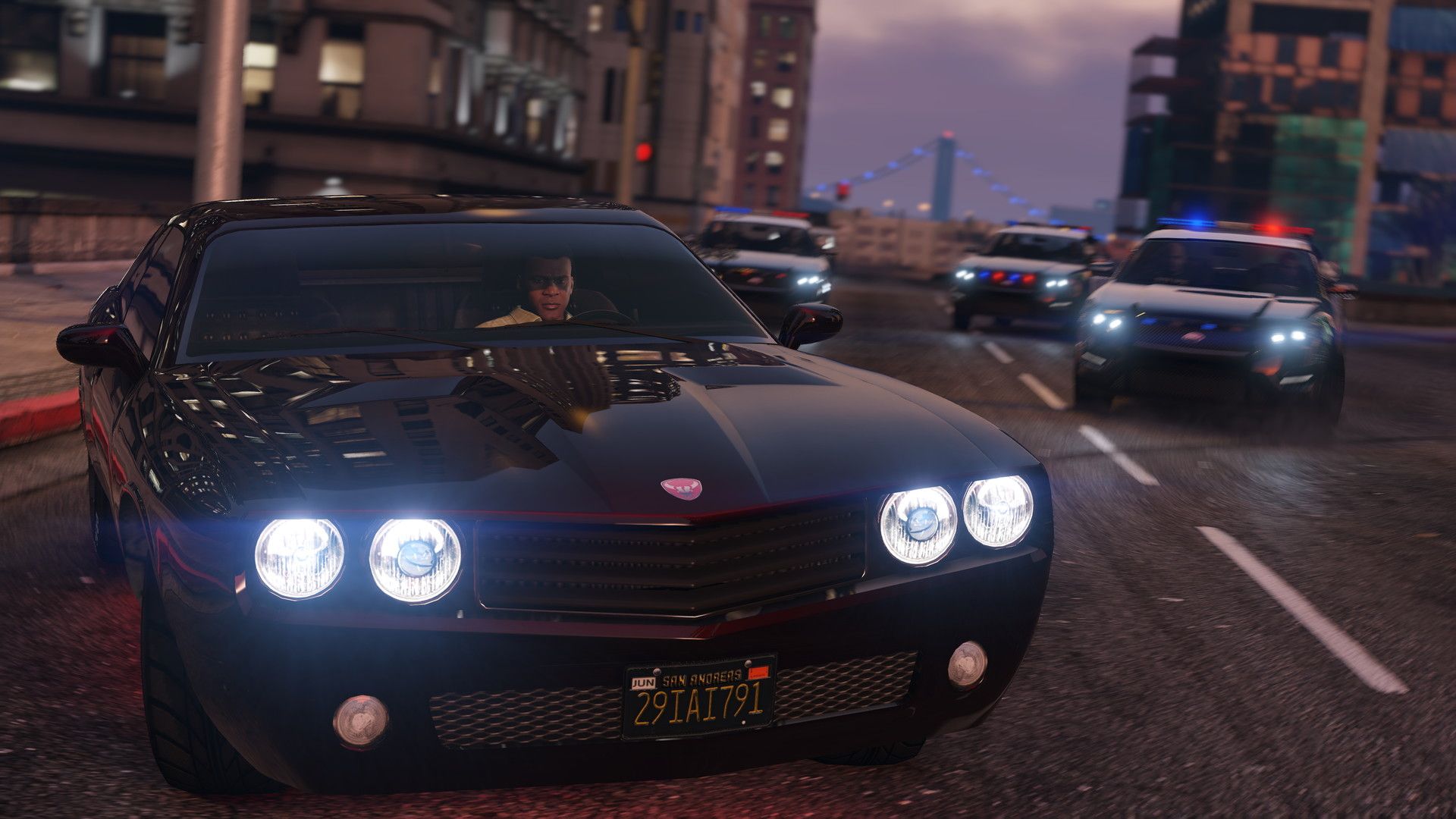 GTA V official screenshot showing a police car chase