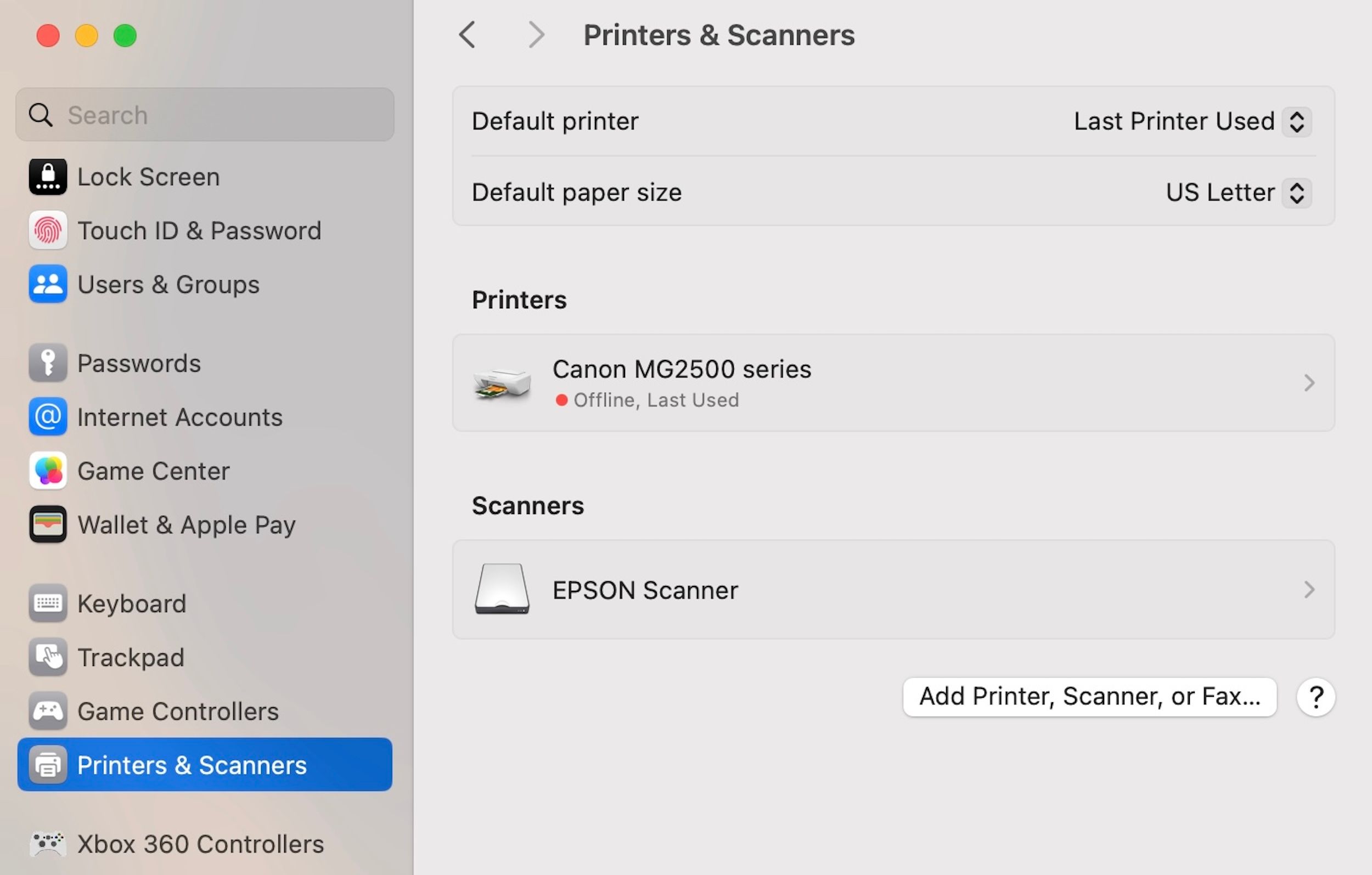 Printers & Scanners menu selected in Mac System Settings.