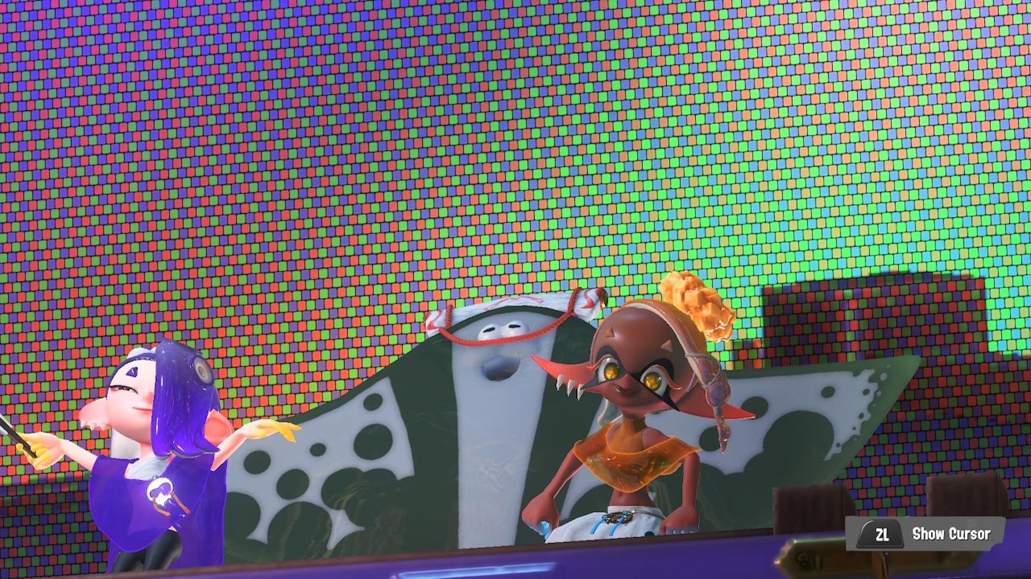 Splatoon 3 hosts performing on stage during a Splatfest.