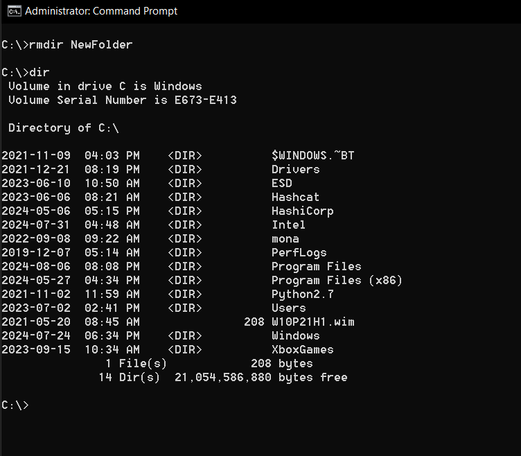 Using the rmdir command in WIndows to remove a folder.