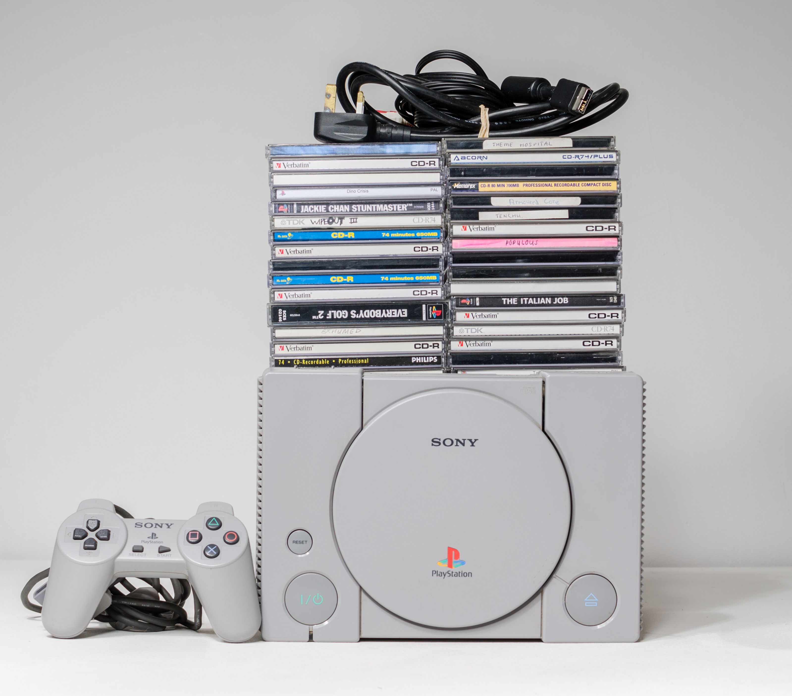  An original chipped modded sony playstation console with copied games from 1994.