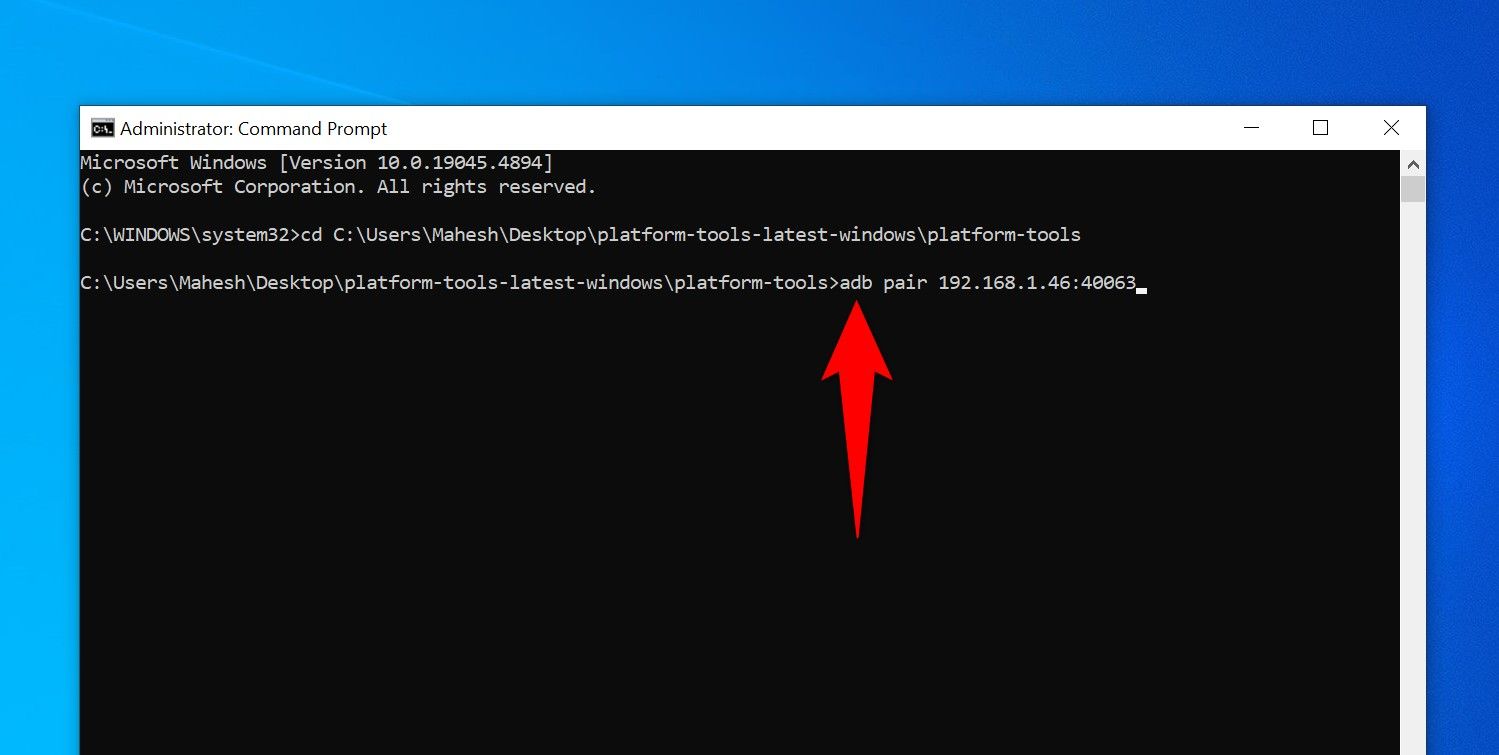 The 'adb pair' command typed in Command Prompt.