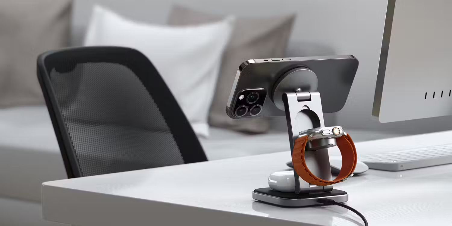 Satechi 3-in-1 foldable wireless charging stand, shown charging iPhone, Apple Watch, and AirPods on a desk.