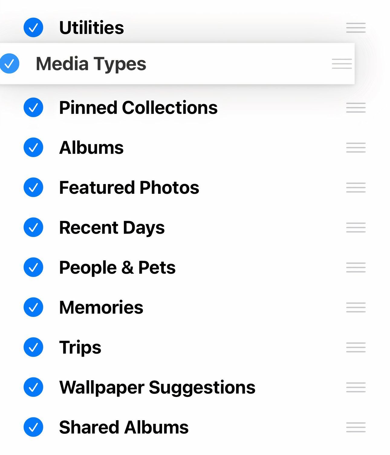 Closeup showing reordering collections in Photos for iPhone.