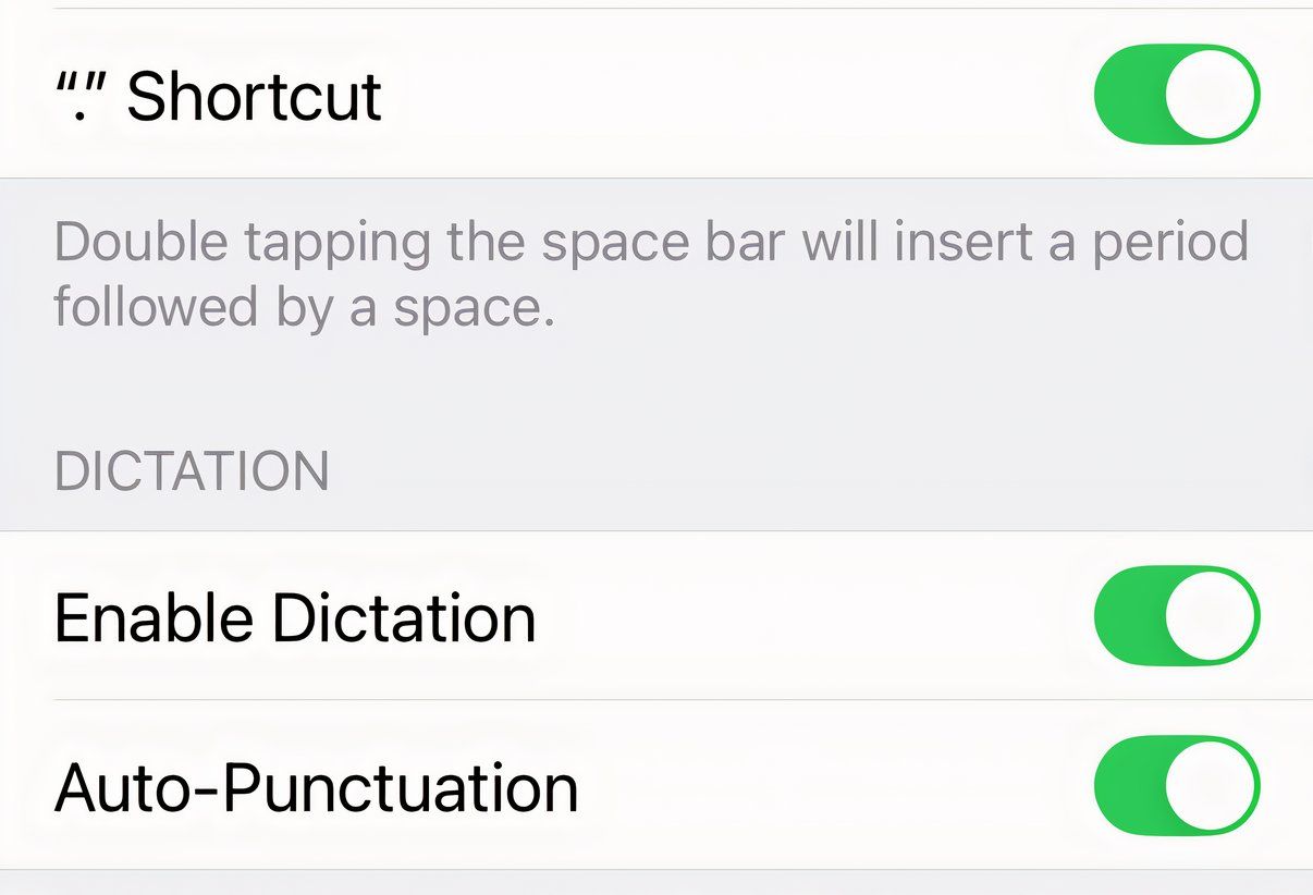 iPhone iOS dialog box showing the tools to Enable Dictation and Auto-Punctuation.