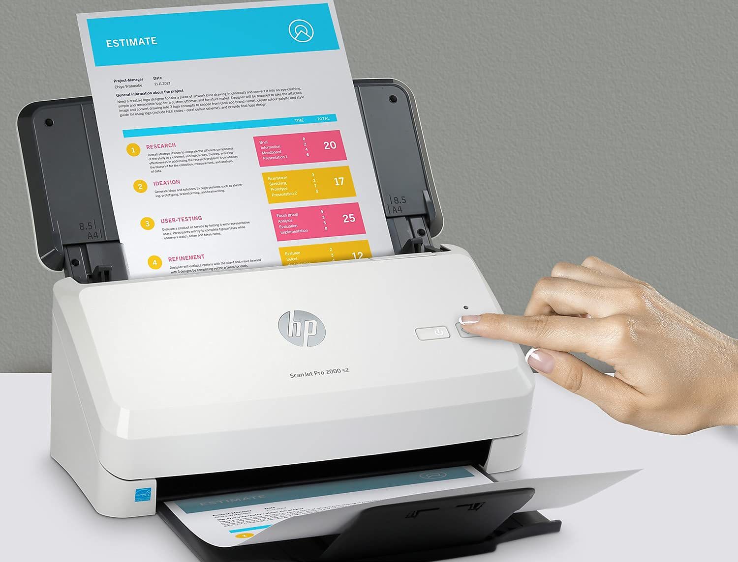 A sheet-fed scanner being used to scan an estimate.