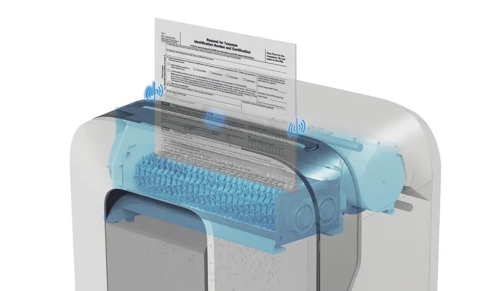 A shredder safely destroying a tax document.