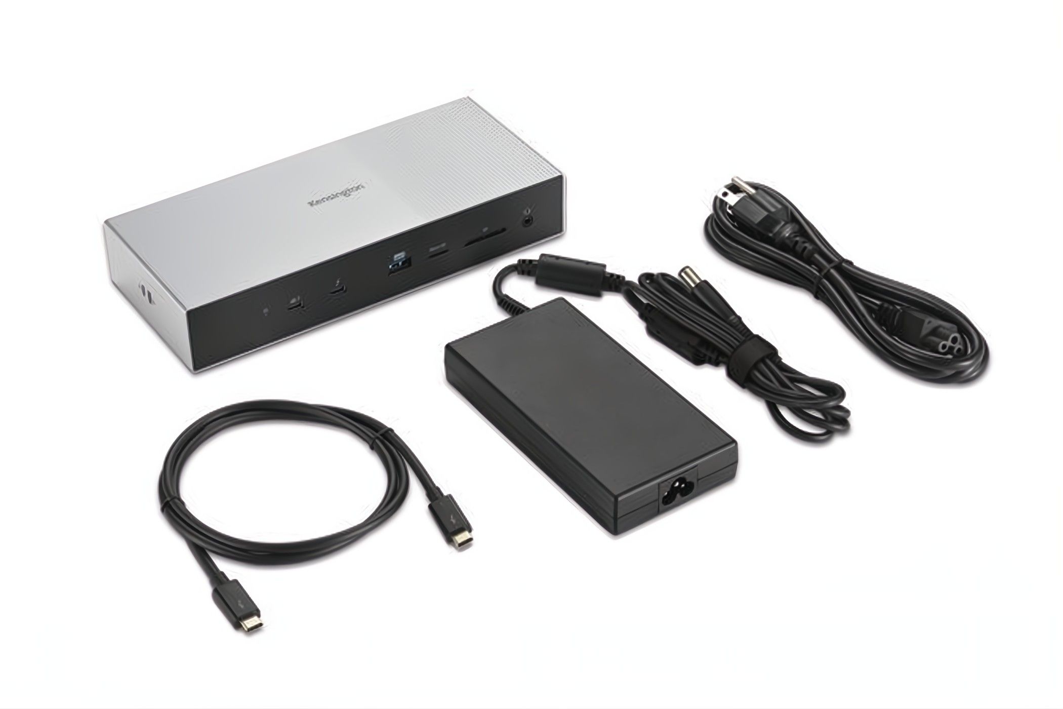 The Thunderbolt 5 Dock next to its power cord, power block, and a thunderbolt cable