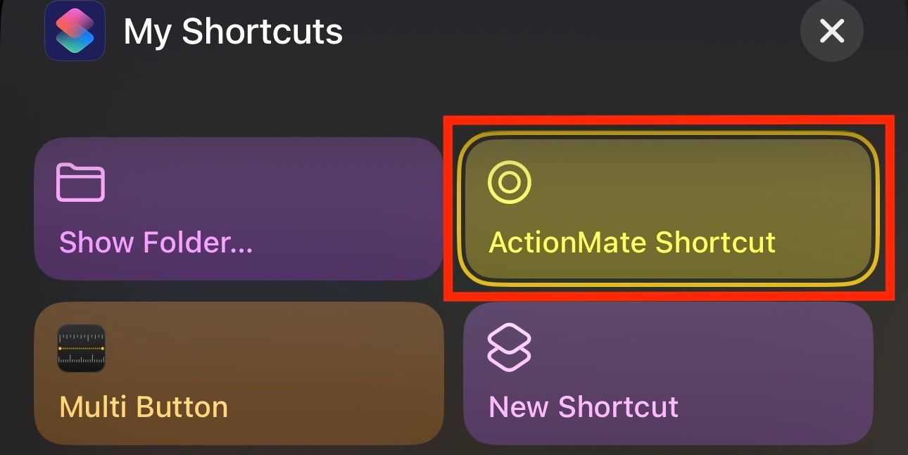 Mapping the iPhone Action button to run the ActionMate shortcut.