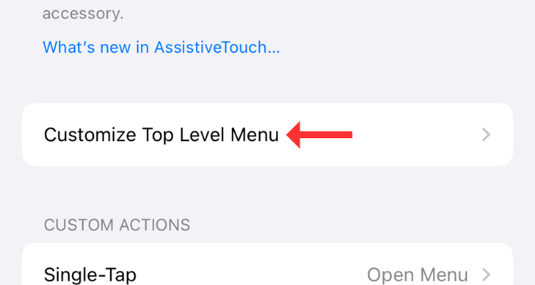 Screenshot of the AssistiveTouch menu with an arrow next to the Customize Top Level Menu option.