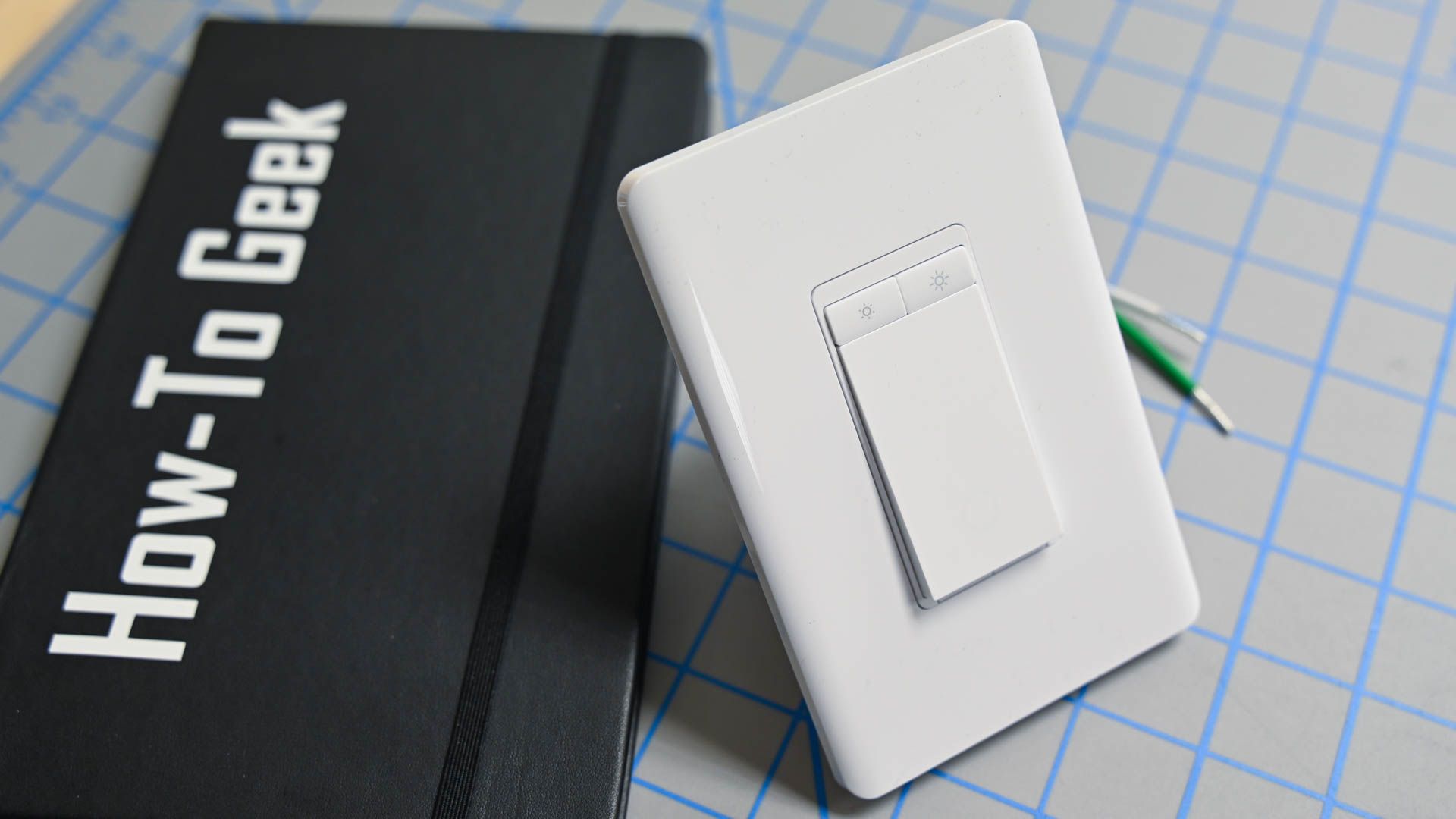 Dimmer buttons on the TP-Link Tapo S505D Smart Wi-Fi Light Switch with Dimmer.