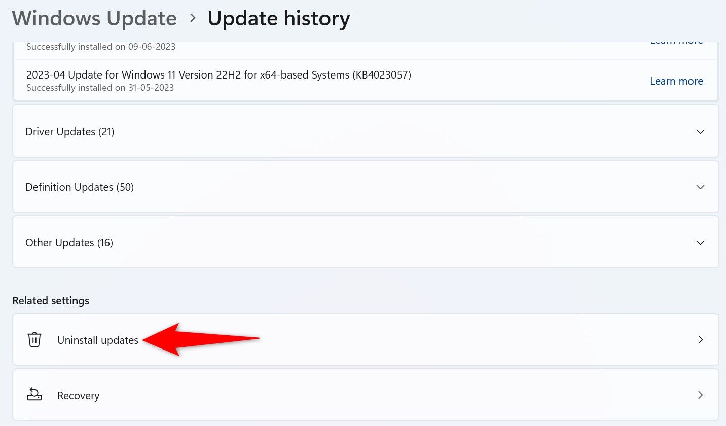 'Uninstall Updates' highlighted in Settings.