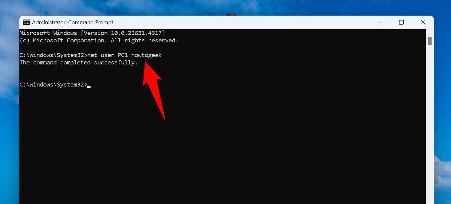 The command to change the user account password typed in Command Prompt.