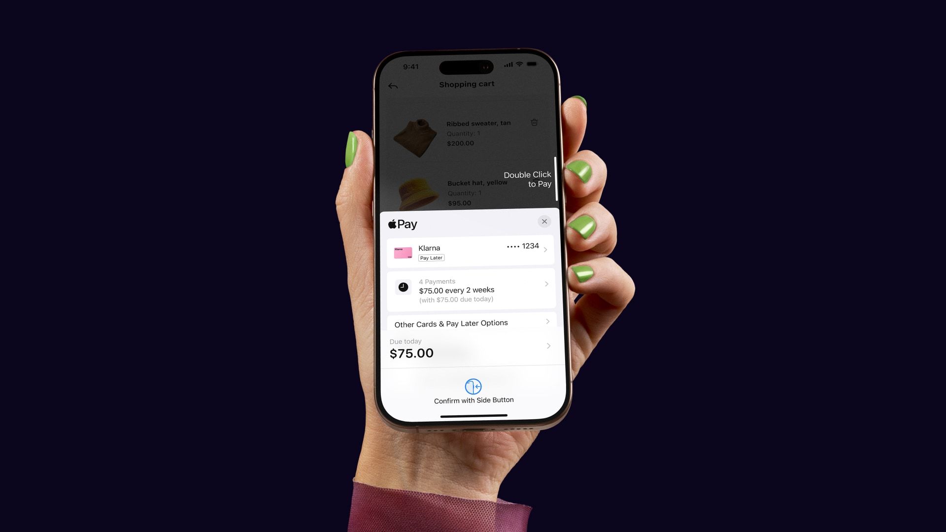 Hand holding an iPhone displaying the Apple Pay interface and installment loan options from Klarna.