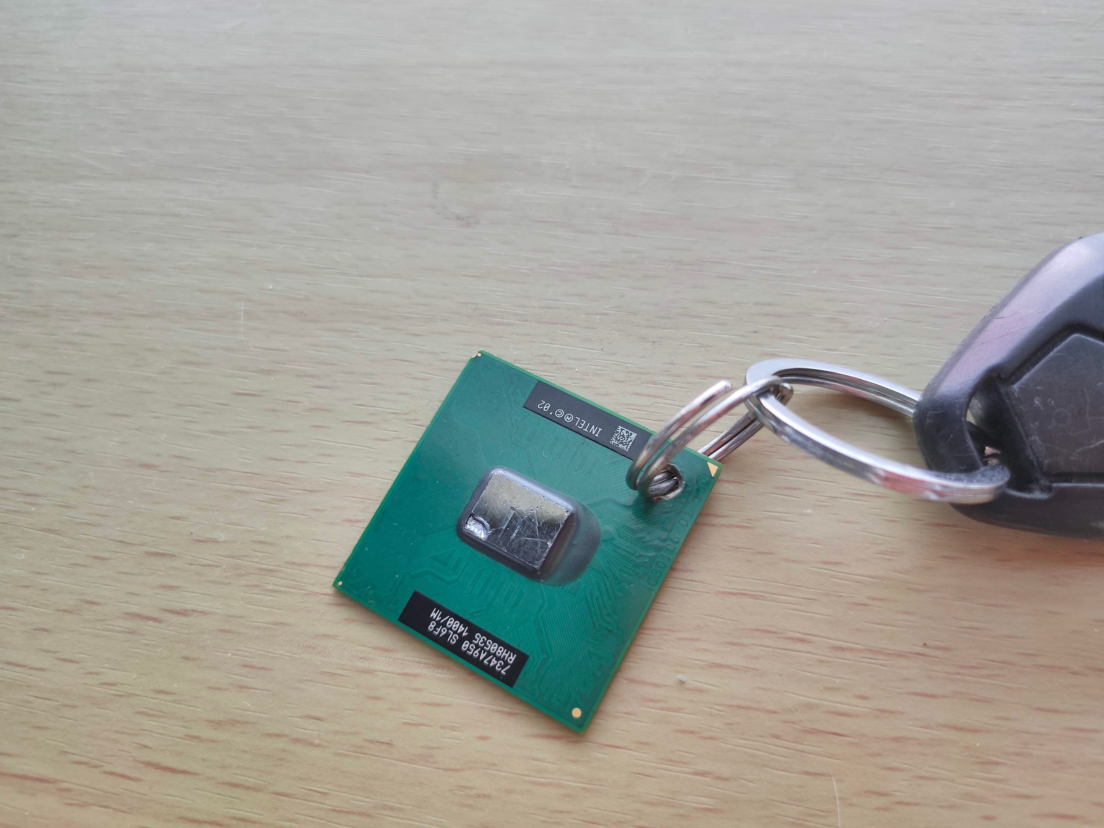 An old Intel CPU turned into a keychain charm.