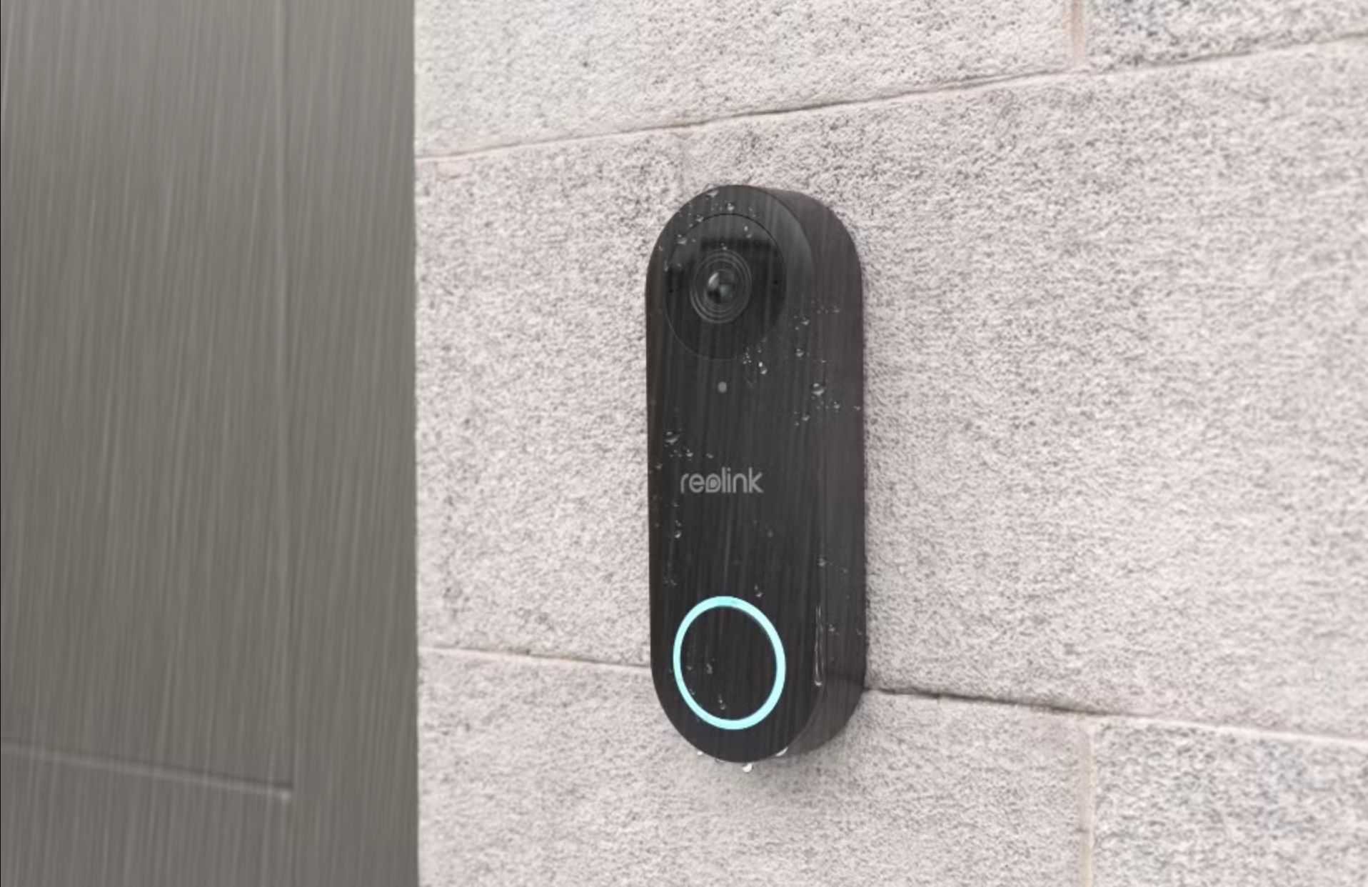 A Reolink video doorbell in the rain.