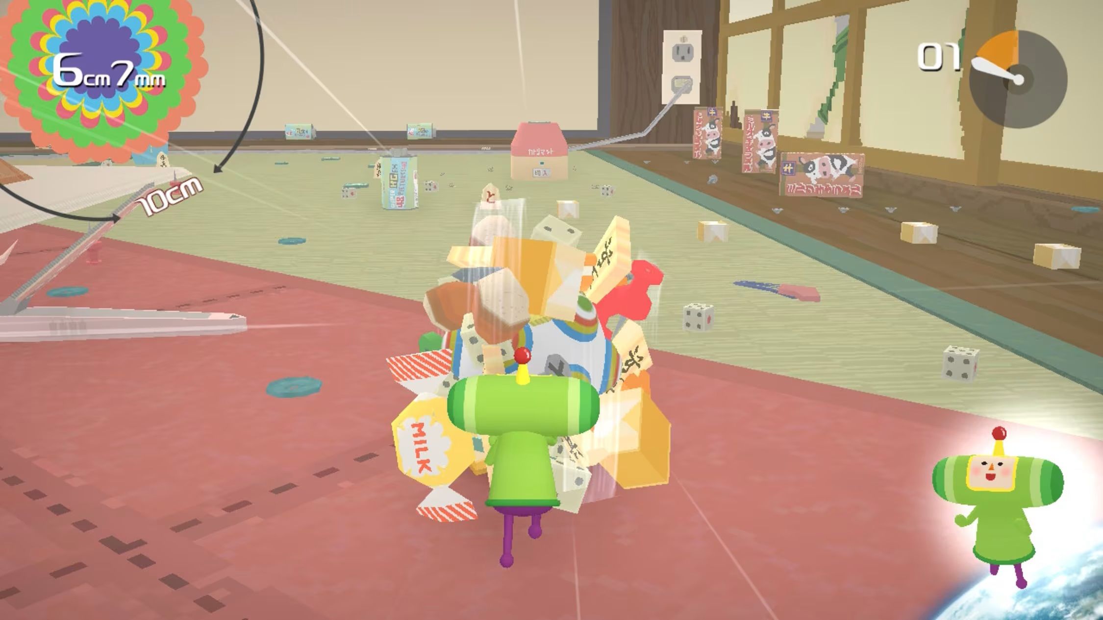 Rolling a giant ball of junk in Katamari Damacy REROLL.