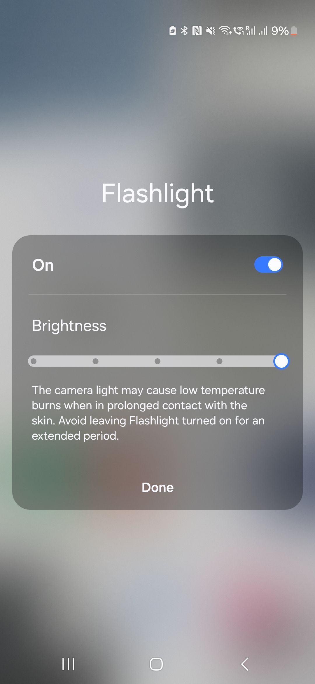 The flashlight brightness slider on an Android phone.