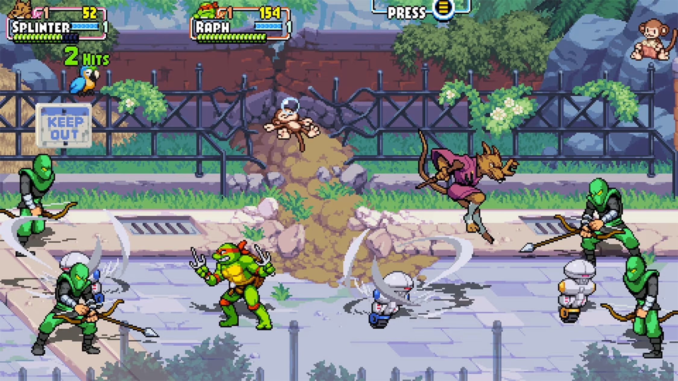 Shredder's Revenge showing Raphael and Master Splinter battling green foot clan ninja.