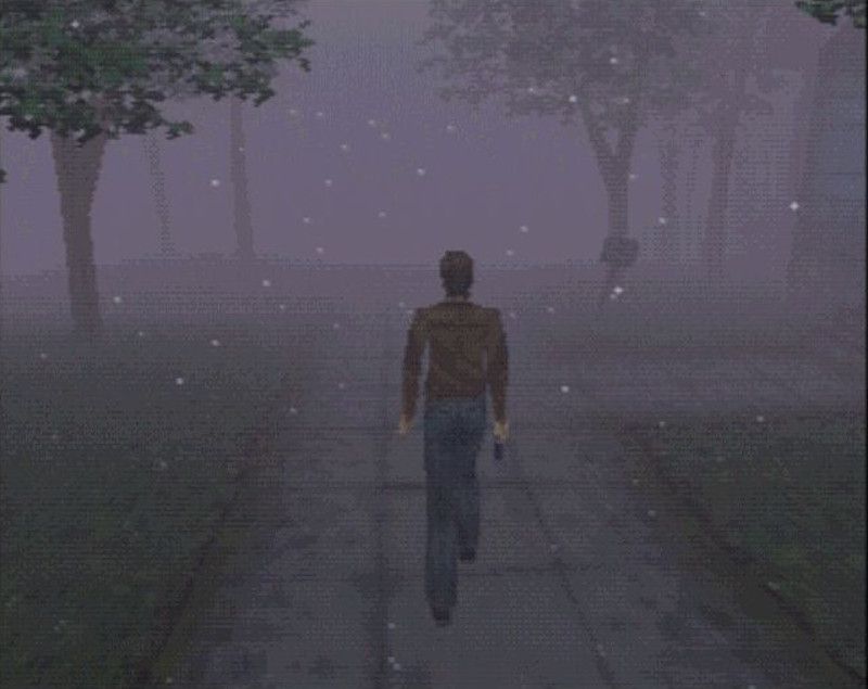 Harry surrounded by thick fog in Silent Hill.