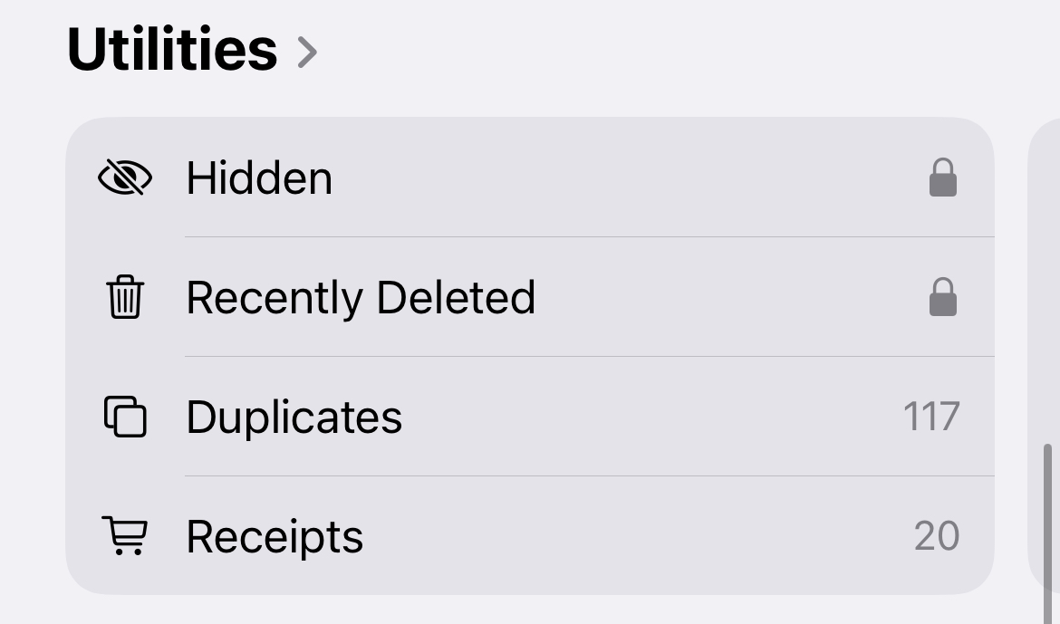 The 'Hidden' and 'Recently Deleted' albums in the 'Utilities' section of the Photos app in iOS 18.