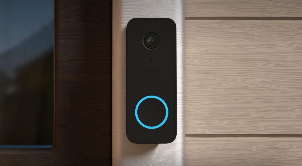 The wyze video doorbell v2 near a front door. 