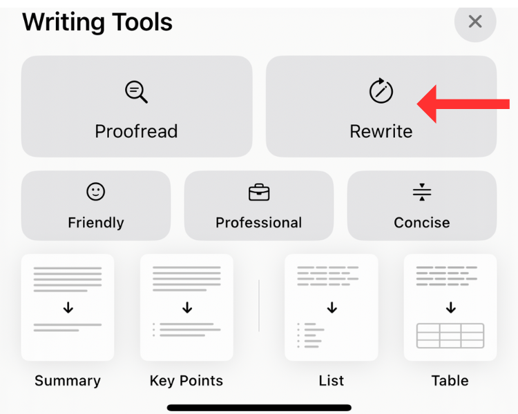 Screenshot of the Writing Tools menu with an arrow next to the Rewrite option.