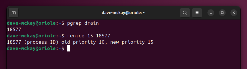 Finding the PID of a process with pgrep, then using renice to adjust its nice value to 15.