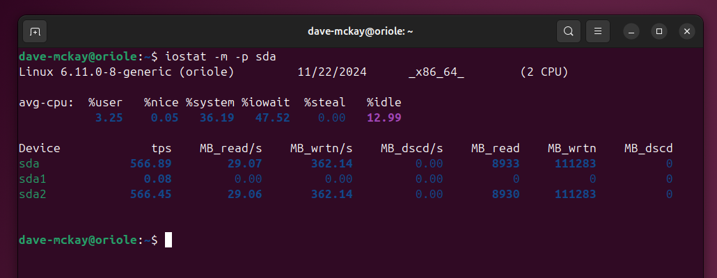 Using the iostat command to look at a single drive, with the values reported in megabytes.