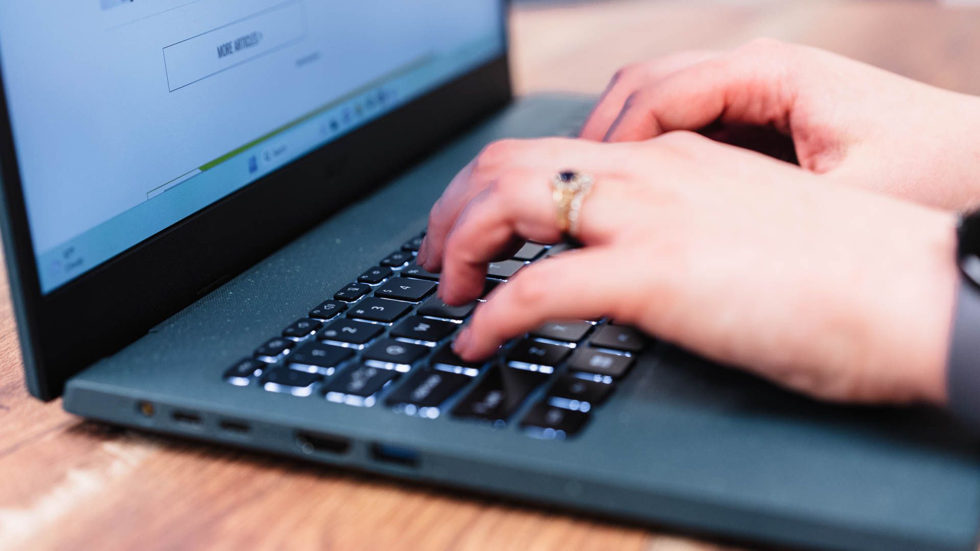 Person typing on the keyboard of the Acer Aspire Vero 15.