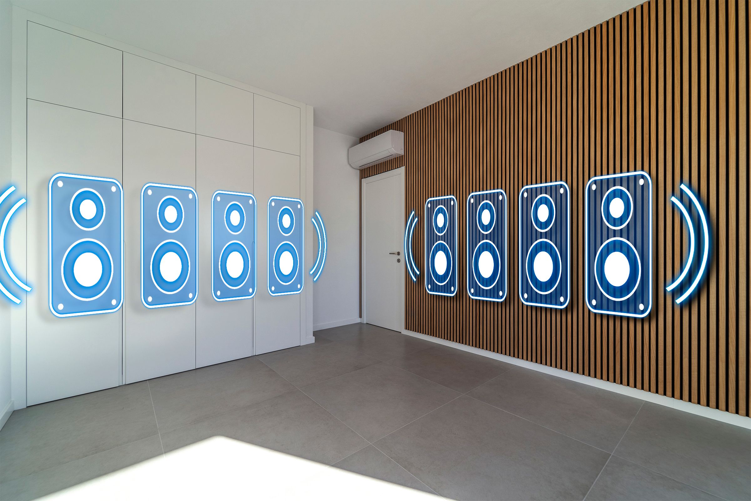 A room with acoustic panels and some illustrated speakers