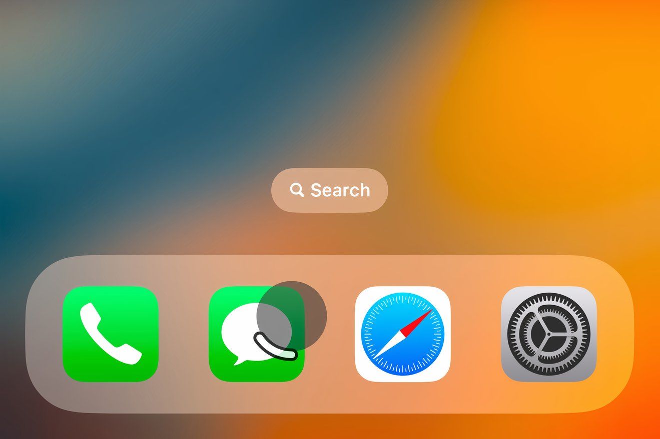 Closeup of the iPhone's Dock, with the dwell pointer with the circle timer filling up overlaid on the Messages app icon.