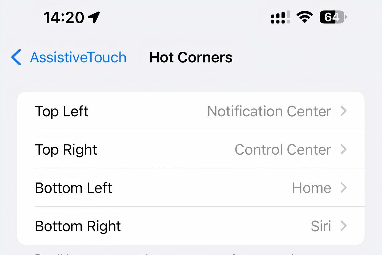 The iPhone's Settings displaying different Hot Screen actions for each screen corner.