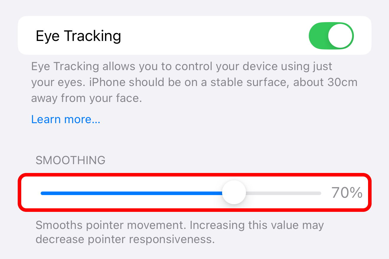 The eye tracking section in Settings on iPhone, with the Smoothing slider annotated.