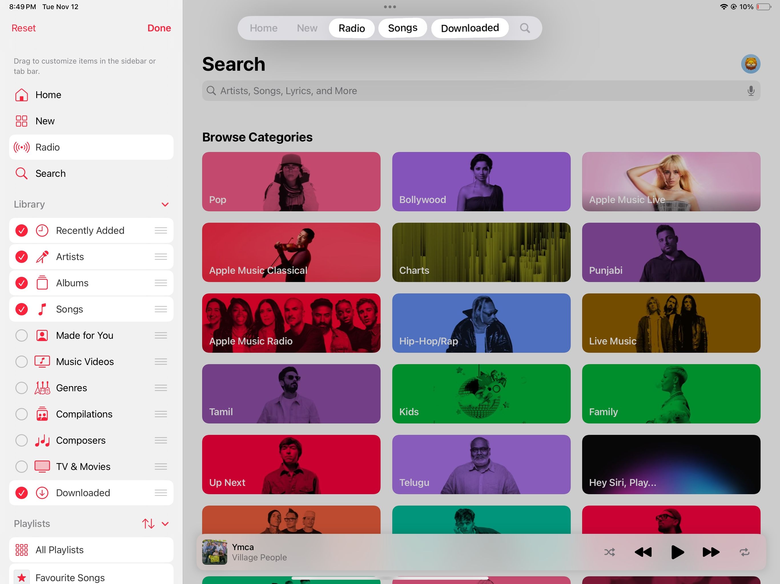 Customizing the tab bar in Apple's Music app on a Mac.