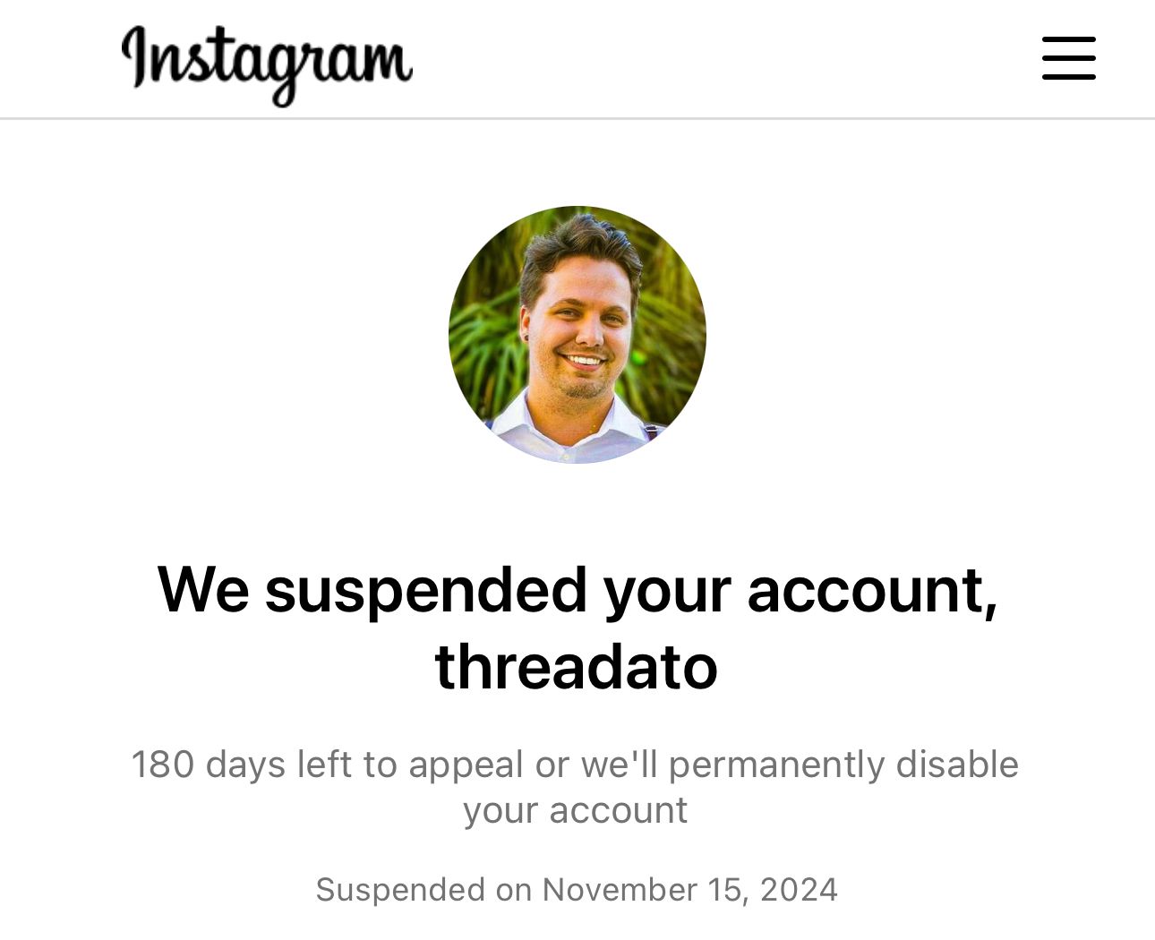 A screenshot of a suspended account notice on Instagram/Threads.