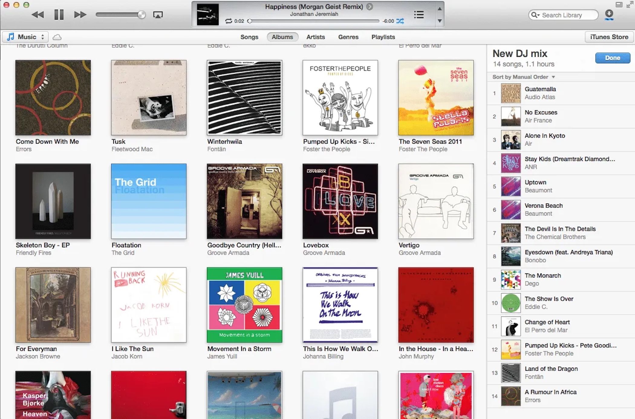 Creating a playlist in a sidebar in iTunes 11, with the library in cover view.