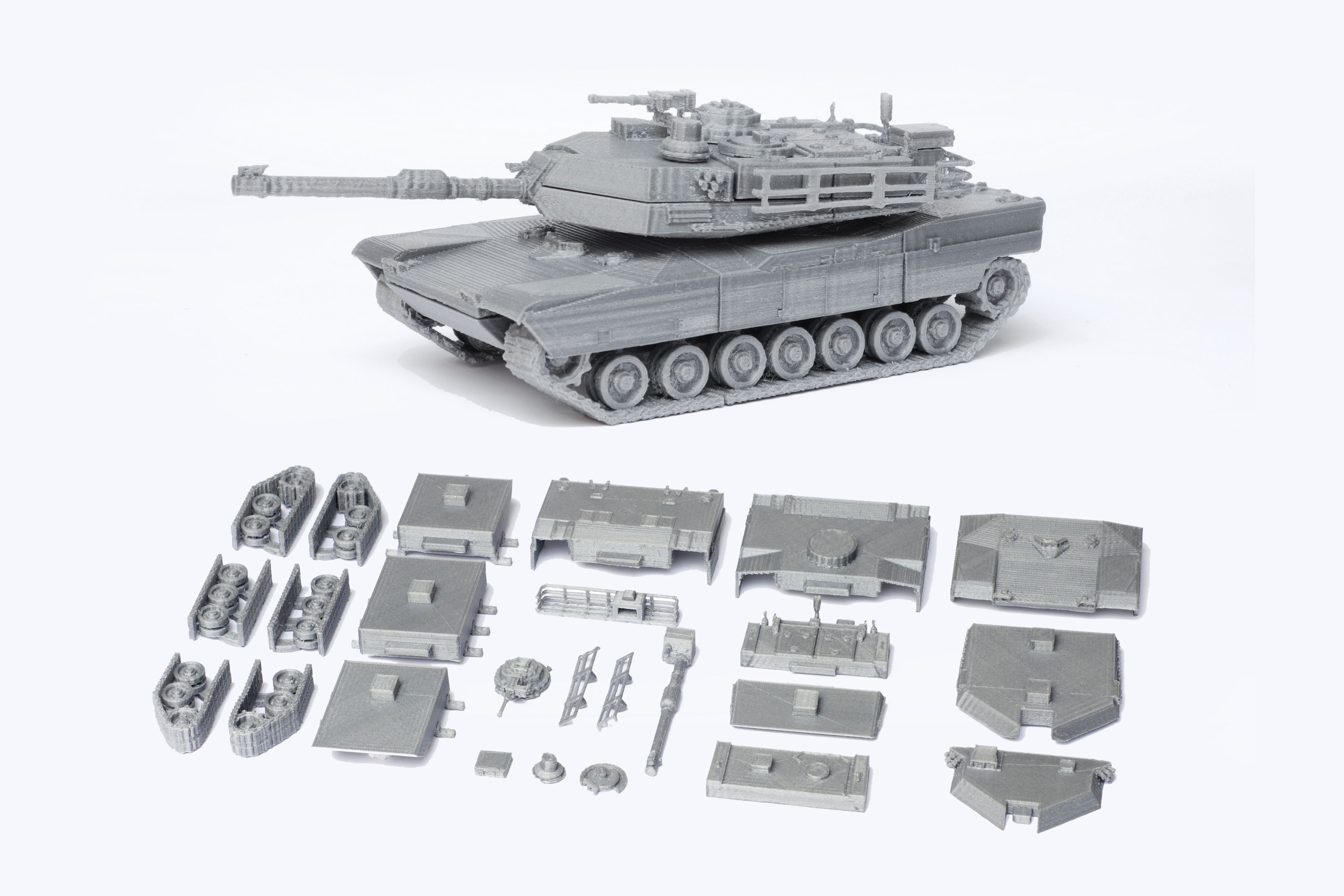 A 3D printed model kit of an M1 Abrams tank.